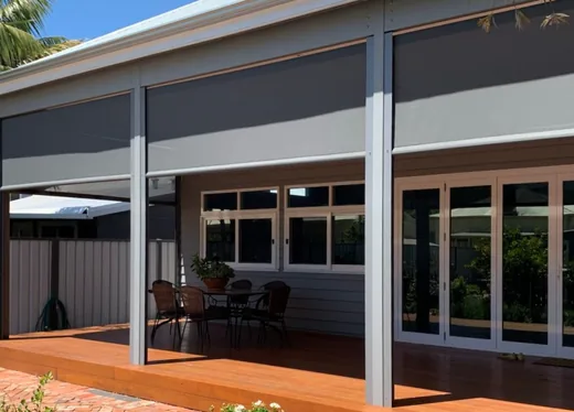 An MIY Outdoor zipscreen, installed on a patio