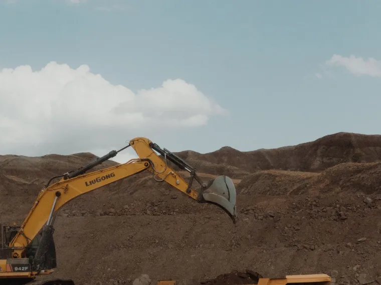 An excavator working an open cut site